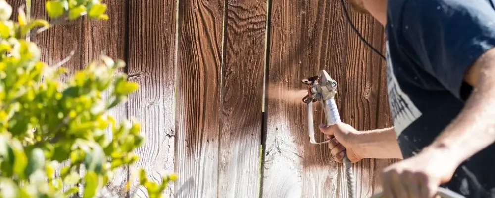 how to stain a fence with a sprayer